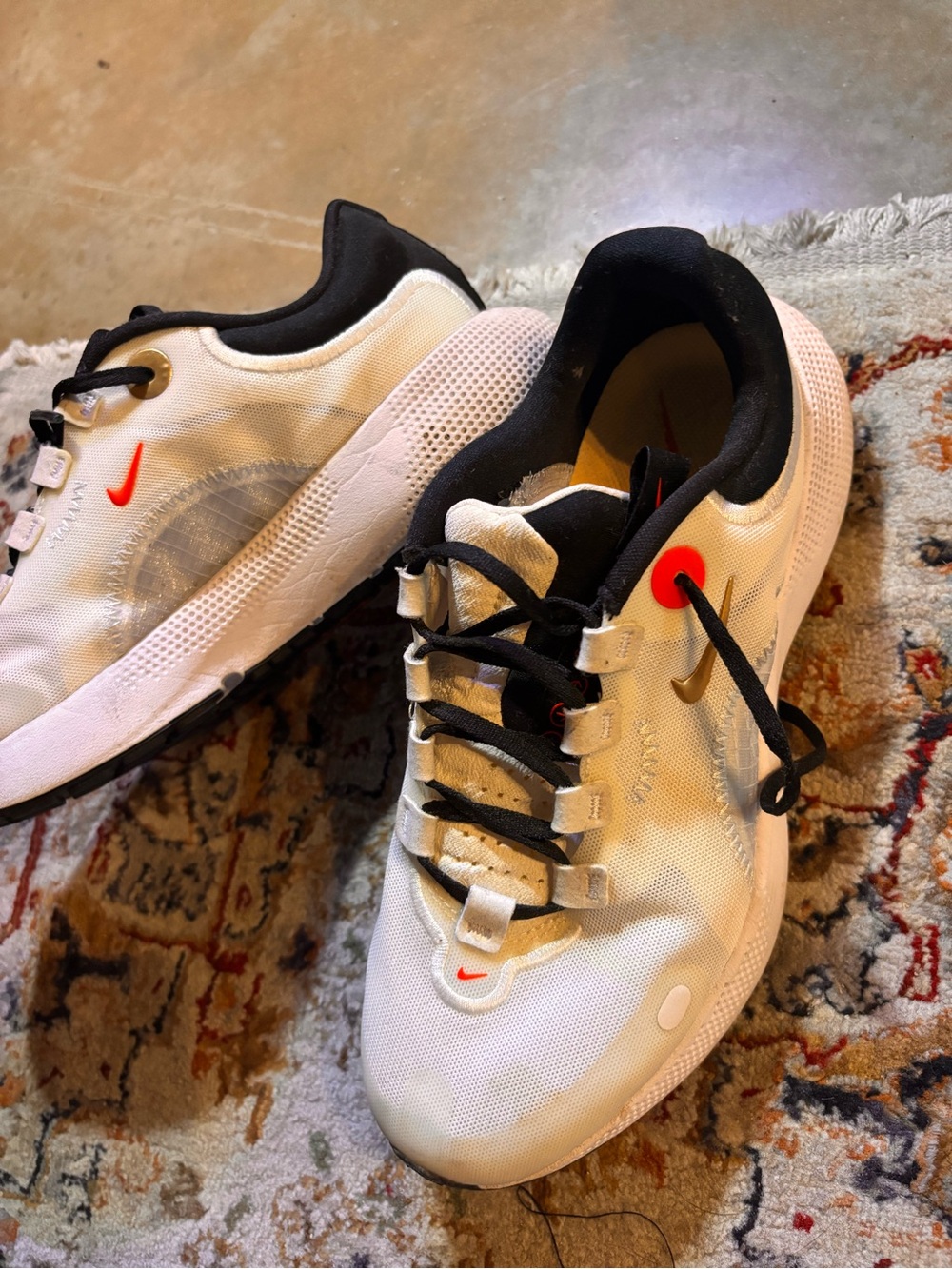 Nike Women’s White Athletic Shoes with Black Trim and Red Accents